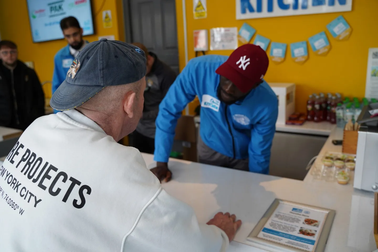 New signing Alassana Jatta visits The Open Kitchen with the Foundation