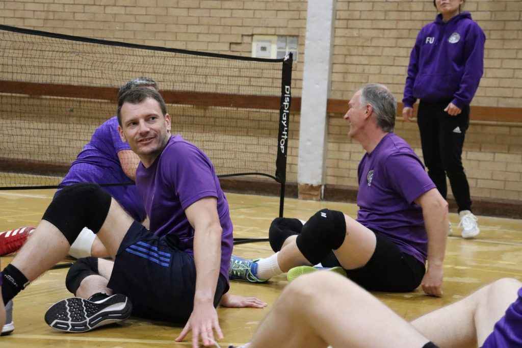 Participants enjoy a game of Sitting Volleyball at the Portland Centre, Nottingham. 